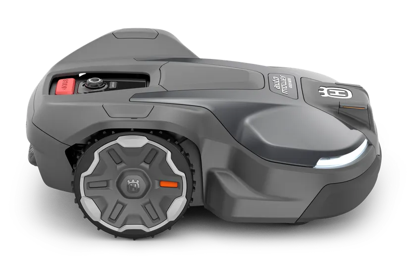 洗練されたデザインと目に見えるコントロールパネルを備えたロボット芝刈り機の側面図。